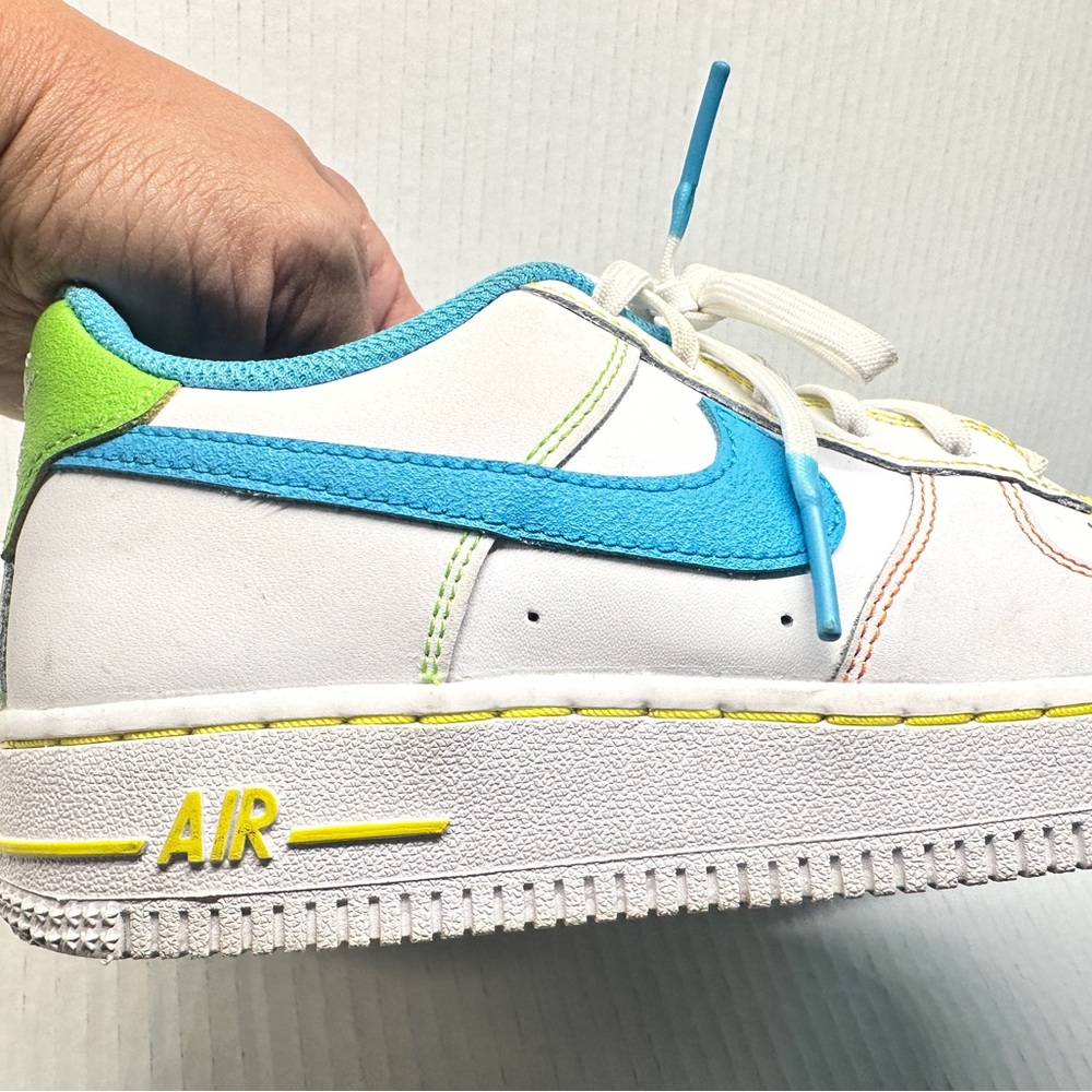 Nike Kids White and Blue Sneakers with Yellow Accents